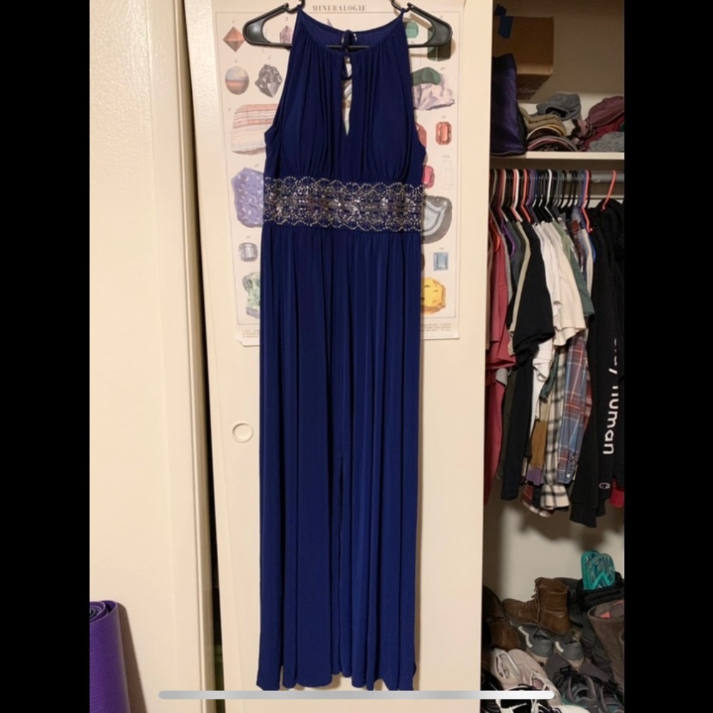 Long navy blue formal dress. Worn to a graduation.